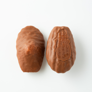 Madeleines natures enrobées de chocolat au lait